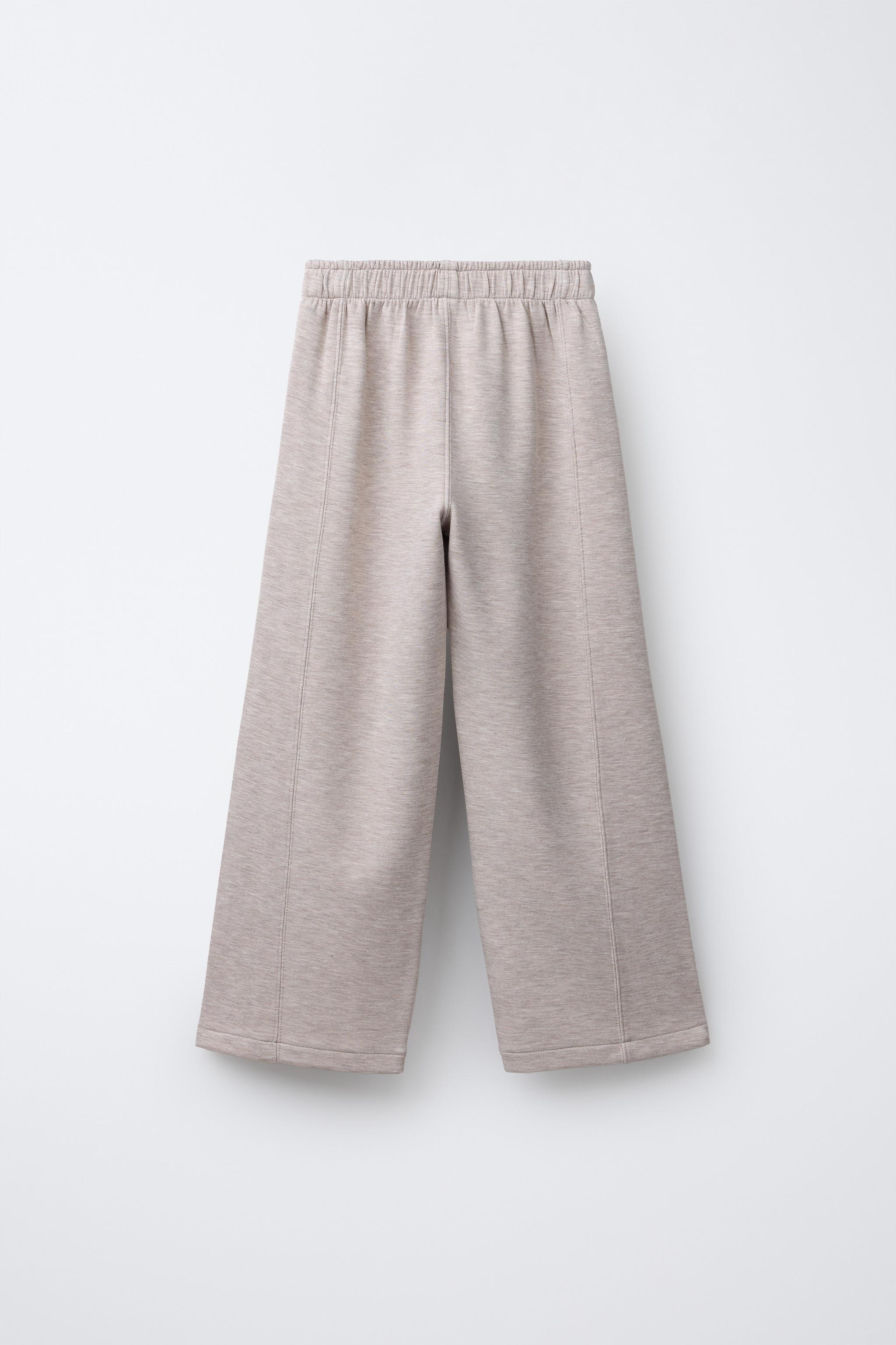 WIDE LEG GYM PANTS WITH CONTRAST PIPING